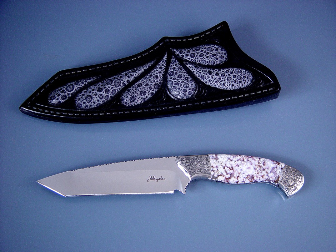 "Alegre" Obverse side view. 440C high chromium stainless steel blade, fully fileworked, mirror finished, hand-engraved 304 stainless steel bolsters, Orbicular Amethyst Gemstone handle, Frog skin inlaid in hand-carved leather sheath