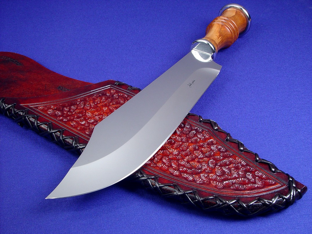 "Andrimne" Chef's Master Knife, obverse side view in 440C high chromium stainless steel blade, 304 stainless steel guard ferrule and pommel ferrule, Peach hardwood turned handle, hand-stamped, hand-laced leather sheath