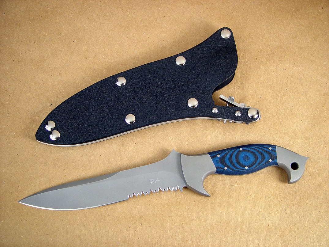 "Anzu" obverse side view; Tactical knife in bead blasted 440c stainless steel blade, 304 stainless steel bolsters, G10 epoxy-fiberglass laminate handle, locking kydex, aluminum, stainless steel combat sheath