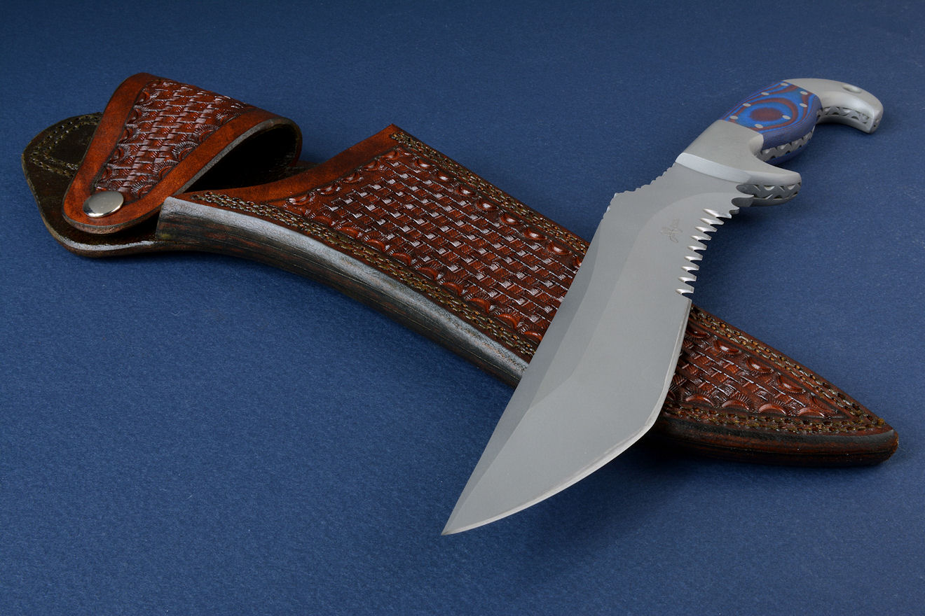 "Arcturus" obverse side view in ATS-34 high molybdenum stainless steel blade, 304 stainless steel bolsters, Red/Blue G10 fiberglass/epoxy composite laminate handle, locking kydex sheath with leather sheath and complete accessory package