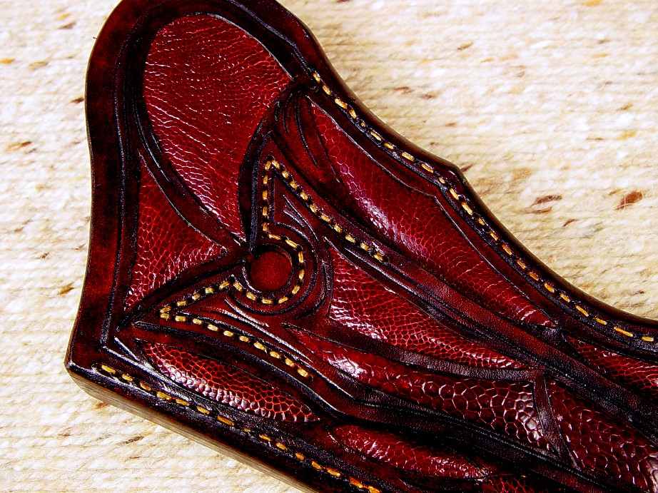 Burgundy Ostrich leg skin inlay in carved leather sheath for "Argiope" knife