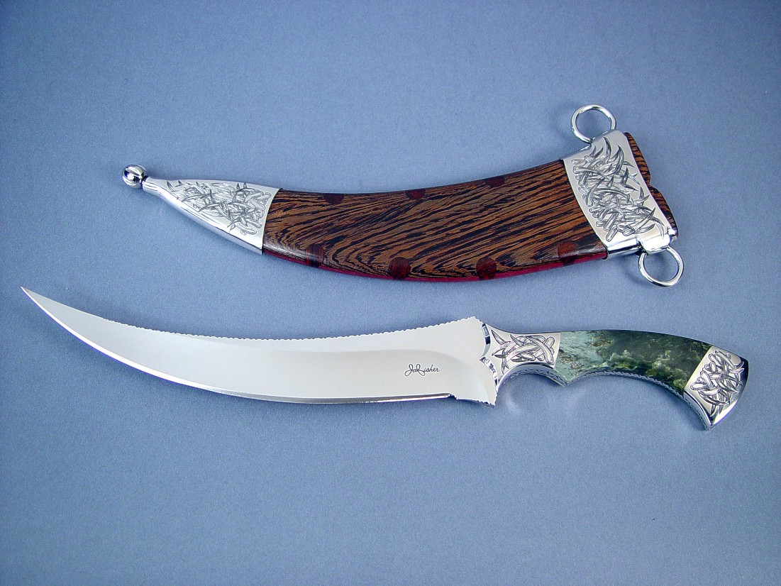 "Desert Wind"  Persian Dagger, Obverse side view: 440C high chromium stainless steel blade, hand-engraved 304 stainless steel bolsters, Mossy Nephrite Jade gemstone  handle, stainless steel engraved sheath, Wenge, Cocobolo, Purpleheart hardwood, with custom display stand