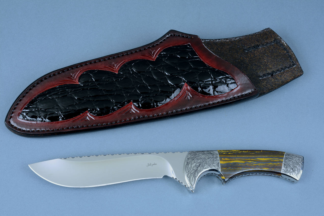 "Golden Eagle" custom knife, stand view in CPM154CM high molybdenum stainless steel blade, hand-engraved 304 stainless steel bolsters, Australian Tiger Iron gemstone handle, hand-carved, hand-dyed leather sheath inlaid with Caiman skin
