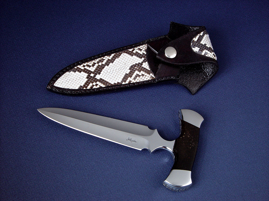 "Grim Reaper" obverse side view. Long-bladed push dagger, an effective stylel and substantial mass in beautiful double-edged high molybdenum stainless tool steel. Sheath is Python skin inlaid in hand-carved leather.