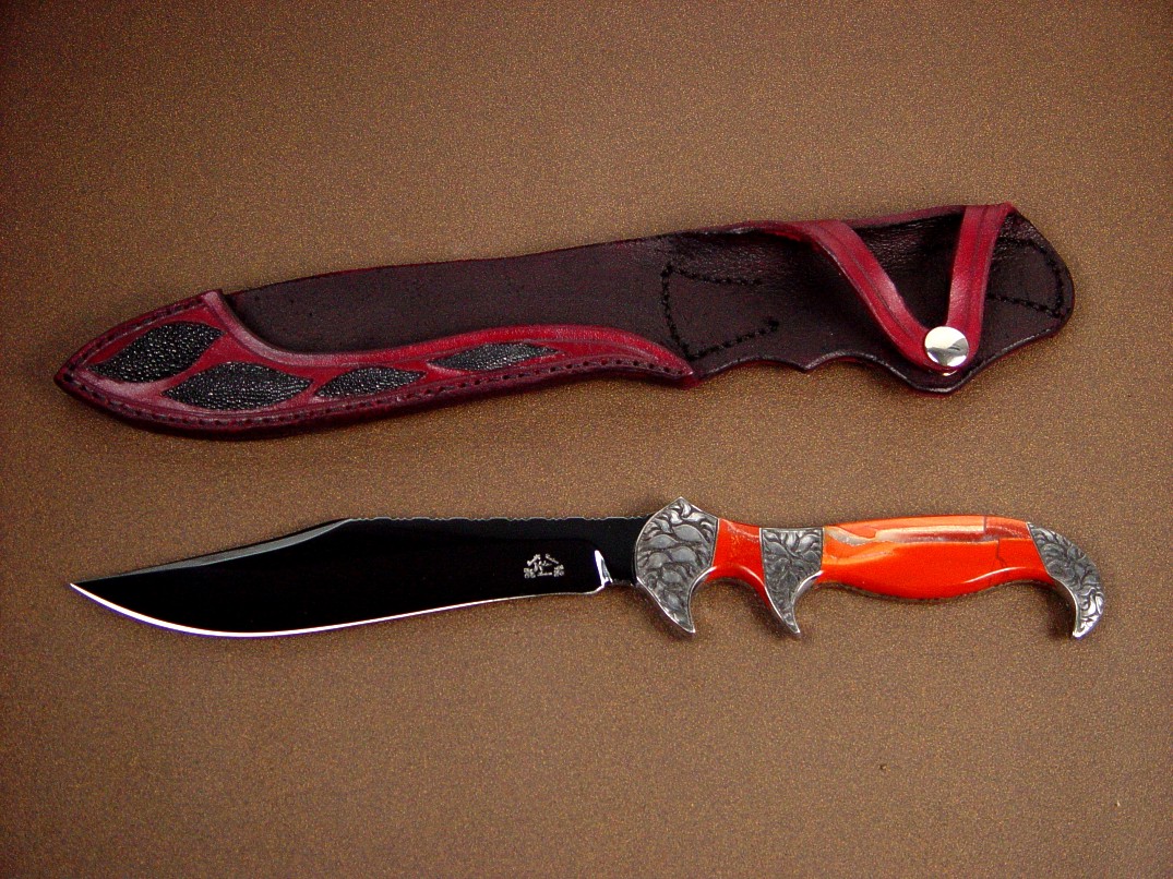 "Ladron" in blued O-1 blade, hand-engraved steel bolsters, Red River Jasper gemstone handle, stingray skin inlaid in leather sheath