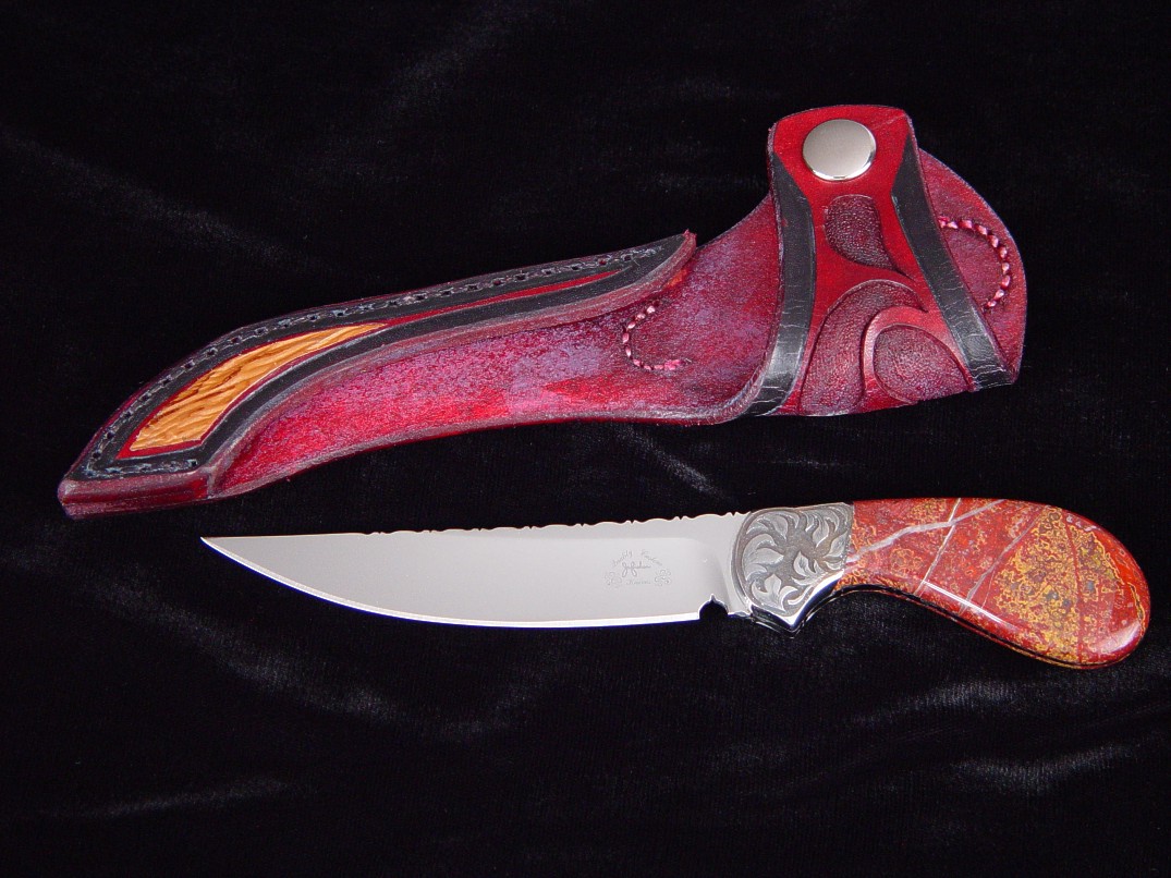 "Pecos II", obverse side view in ATS-34 high molybdenum stainless steel blade, hand-engraved carbon steel bolsters, New Mexico Jasper gemstone handle, shark skin inlaid in hand-carved leather sheath