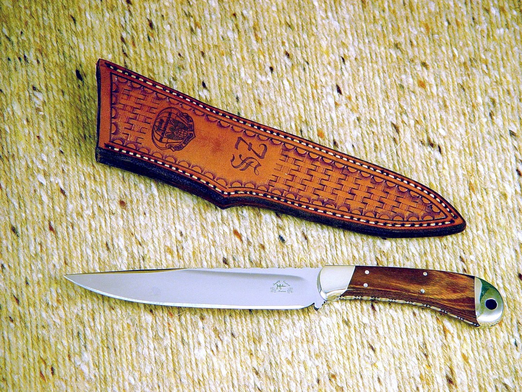 Engraved leather sheath on "Sanchez" boning knife, commemorating Pararescue service. Sheath is basketweave tooled, hand-stitched