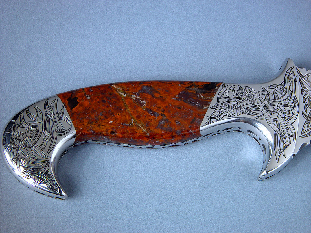 "Tribal" (Helhor pattern) reverse side handle detail. Pilbara picasso jasper is tough, hard, and durable microcrystalline quartz, with a high glassy polish