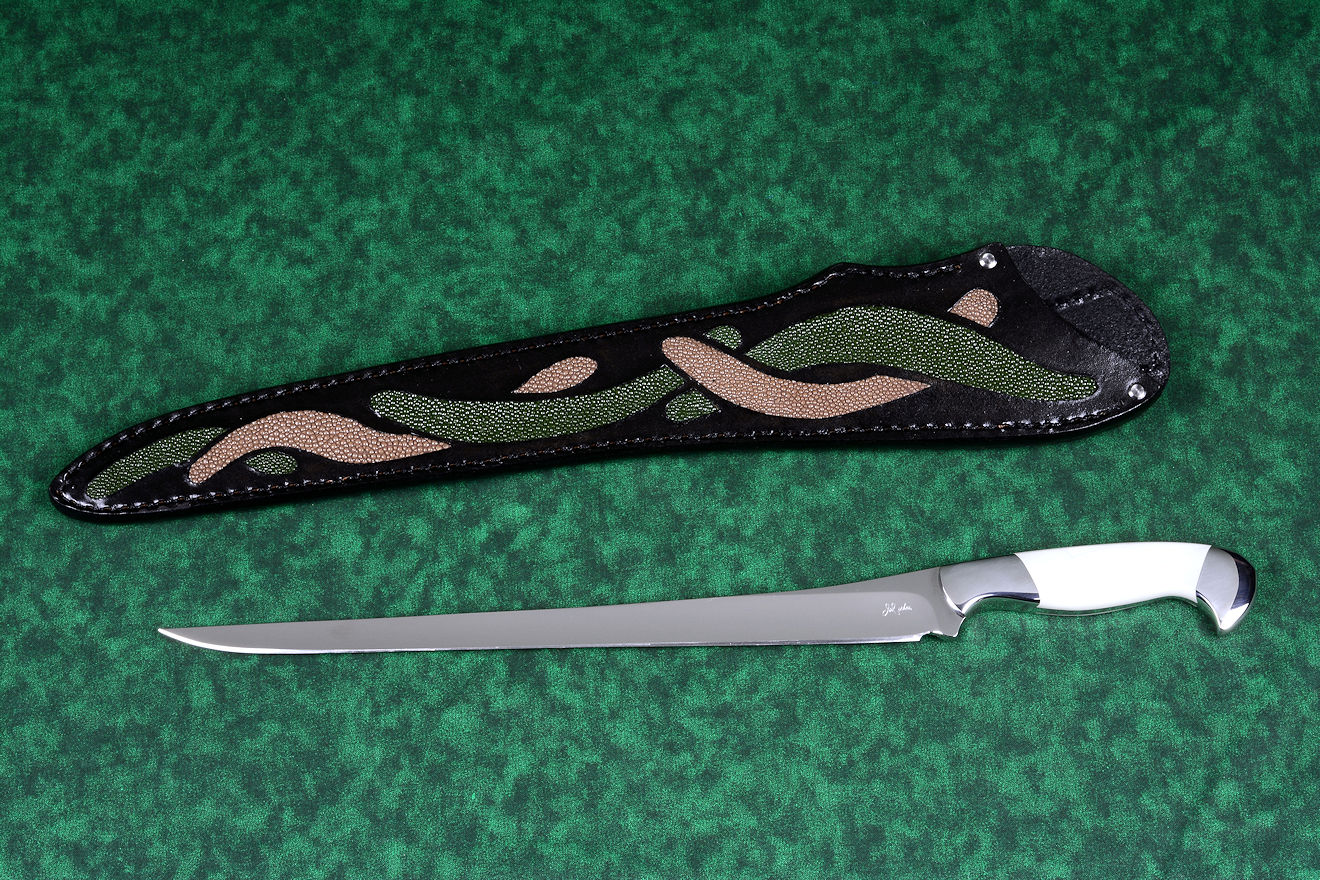 "Wisp" fine handmade fillet knife obverse side view in T3 deep cryogenically treated CPM 154CM high molybdenum powder metal technology martensitic stainless steel blade, 304 stainless steel bolsters, Willow Creek Jasper gemstone handle, hand-carved leather sheath inlaid with green, tan ray skin