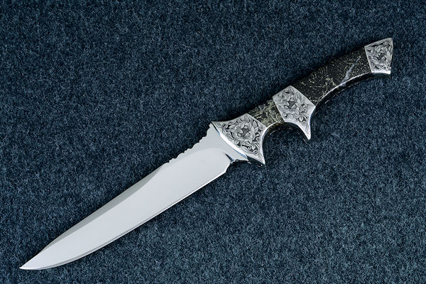 "Patriot" obverse side view in CPM154CM high molybdenum powder metal technology martensitic stainless steel blade, hand-engraved 304 stainless steel bolsters, Golden Midnight Agate gemstone handle, Emu skin inlaid in hand-carved leather sheath