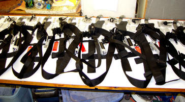 Group of counterterrorism knives under construction with sternum harnesses