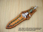 "Ariel" athame, athane type dagger, sheathed view. Sheath is hand-tooled and dyed leather shoulder, hand-stitched