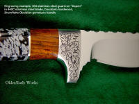 "Aspen" Obverse side view:440c high chromium stainless tool steel blade, hand-engraved 304 stainless guard and pommel, Cocobolo hardwood and Snowflake Obsidian gemstone handle, hand stamped and tooled leather sheath