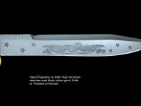 Fine hand- engraving by Jay Fisher on "Freedom's Promise" knife blade in 440C high chromium stainless steel