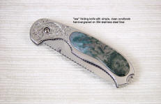 Hand-engraved high chromium-nickel 304 austenitic stainless steel with inlaid Indian Green Moss Agate Gemstone in interframe linerlock folding knife