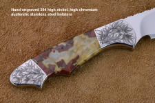 "Thuban" reverse side engraving detail in CPM154CM powder metal technology high molybdenum stainless steel blade, hand-engraved 304 stainless steel bolsters, Brecciated Jasper gemstone handle, hand-carved leather sheath inlaid with rayskin