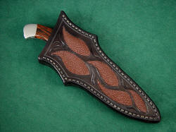 "Alegre" sheathed view. Note deep protective sheath, rear quillon for easy knife draw