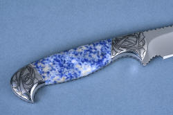 "Antheia" "Eridanus" boning knife handle detail, reverse side. Bolsters are hand-engraved 304 stainless steel in flowing floral pattern