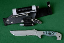 "Arctica" Tactical, Combat, Rescue knife, obverse side view in CPMS90V stainless steel blade, 304 stainless steel bolsters, Green, Black, Pistachio G-10 fiberglass/epoxy composite laminate handle, locking sheath in kydex, aluminum, stainless steel with ultimate belt loop extender and accessories