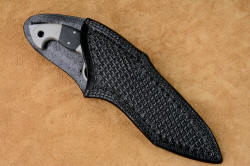 "Ari B' Lilah"  Counterterrorism Tactical Combat Knife, leather sheathed view. Knife rests deep and protected in sheath, high back protects wearer from talon and blade