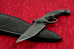 "Ari B'Lilah" professional counterterrorism knife, point detail. Edge and point are single bevel, with one flat bevel forming the cutting edge