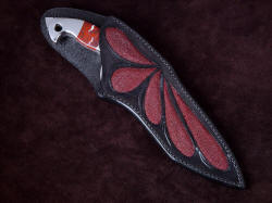 "Ari B'Lilah" sheathed view. Sheath is deep and protective, with exposed handle and high back for wearer protection
