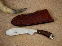 "Cattleman" castrating knife in ATS-34 high molybdenum stainless steel blade, 304 stainless steel bolsters, Ziricote hardwood handle, hand-stamped basketweave leather sheath