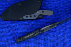 "Celeri" tactical/counterterrorism knife, inside handle tang view. Fully chamfered and dressed elliptical finger ring for security