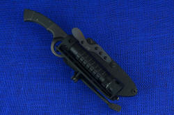 "Celeri" tactical counterterrorism knife with mounted HULA flashlight accessory and Maglite MAGTAC 