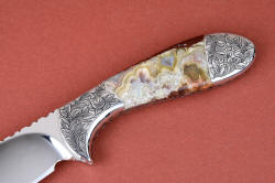 "Chicoma" obverse side bolster engraving detail. Bolsters are hand-engraved high nickel, high chromium stainless steel.