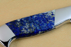 Reverse side gemstone handle enlargement of Concordia Custom Chef's Knives in T3 cryogenically treated 440C high chromium stainless steel blades, 304 stainless steel bolsters, Lapis Lazuli gemstone handles, book case in top grain leather, leather shoulder and belly, hand-carved, stainless steel snaps
