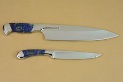 Reverse side view of Concordia and Sanchez Custom Chef's Knives in T3 cryogenically treated 440C high chromium stainless steel blades, 304 stainless steel bolsters, Lapis Lazuli gemstone handles, book case in top grain leather, leather shoulder and belly, hand-carved, stainless steel snaps