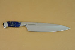 Concordia Custom Chef's knife, reverse side view in T3 cryogenically treated 440C high chromium stainless steel blades, 304 stainless steel bolsters, Lapis Lazuli gemstone handles, book case in top grain leather, leather shoulder and belly, hand-carved, stainless steel snaps