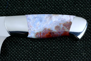 "Corvus" Custom Chef's Knife, obverse side handle detail,  in T3 Deep cryogenically treated 440C high chromium martensitic stainless steel blade, 304 stainless steel bolsters, Bay of Fundy Agate Fossil gemstone handle, hand-dyed, hand-cast silicone prise