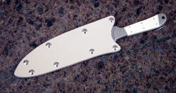 "Cyele" chef's knife, sheathed view. Sheath is a slip fit kydex model for protection of the blade and user