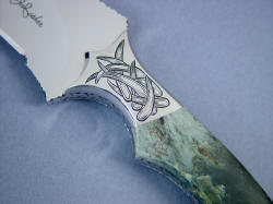"Desert Wind" obverse side front bolster detail. Engraved pattern echoes the curvature of the blade.
