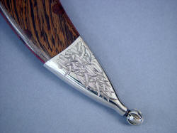 "Desert Wind" reverse side chape tailpiece detail. Fine finial terminating the sheath in mirror polished stainless steel.