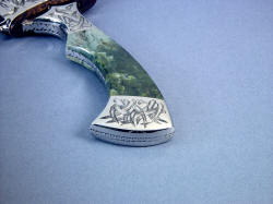"Desert Wind" sheath mouth, knife handle view. Handle is comfortable and elegant.