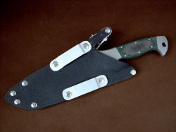 "Diegylis" reverse side view showing optional die-formed belt loops. These loops can be positioned in four different locations on the sheath, offering a variety of mounting options.