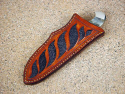 "Fornax" sheathed view. Sheath is fully protective and deep, in lacquered and sealed leather with stingray skin 