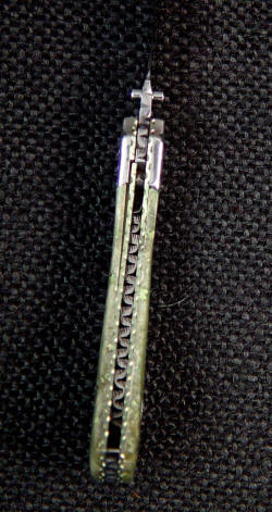 "Gemini" linerlock folding knife, inside handle detail. Note full filework and engraving even inside handle spacer