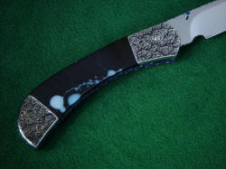 "Gemini" linerlock folding knife, reverse side handle detail. This is a hard gemstone, very tough and will outlast all the metal components of the knife with little or no care.