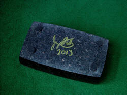 "Gemini" granite case bottom, set with inlaid neoprene feet, with artist's signature.