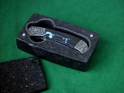 "Gemini" fine linerlock handmade folding knife in case of Black Galaxy Granite lined with black suede leather