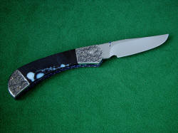 "Gemini" reverse side view. Lines of blade are elegant, choil is sculpted, edged is razor-keen