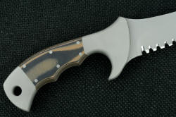 "Ghroth" reverse side handle detail. Coyote/Black G10 fiberglass/epoxy laminate composite is tough and extremely durable. Hammerhead serrations are aggressive and extremely strong.