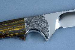 "Golden Eagle" 3 power enlargement of the reverse side front bolster. Strong, punchy design is permanently engraved in tough stainless steel
