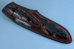 "Golden Eagle" sheath back view. Belt loop and back are both inlaid with black glazed Caiman skin, in pattern design matching engraved bolsters of the knife