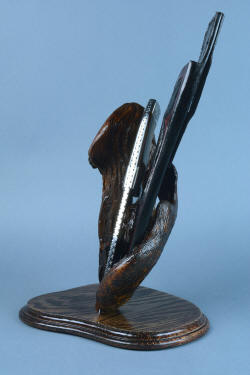 "Golden Eagle" fine handmade custom knife, sheath, and stand, knife spine, sheath edge view in stand