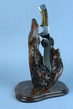 "Golden Eagle" custom knife and stand, with knife alone in stand. This gives an entirely different appearance of the piece, accenting the striking gemstone handle